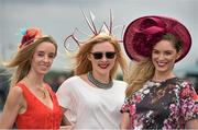 31 July 2014; Pictured are, from left to right, Ruth Maria Murphy, Elaine Wyrnne and Suzie McAdam, all from Blackrock, Co. Dublin, enjoying a day at the races. Galway Racing Festival, Ballybrit, Co. Galway. Picture credit: Barry Cregg / SPORTSFILE