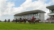 31 July 2014; A general view of the field passing the stand after the start of the GuinnessPlus App Beginners Steeplechase. Galway Racing Festival, Ballybrit, Co. Galway. Picture credit: Barry Cregg / SPORTSFILE