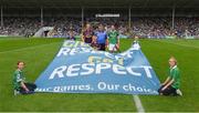 27 July 2014; Wexford captain Matthew O'Hanlon and Limerick captain Paudie O'Brien with referee Barry Kelly and the 'Give Respect Get Respect'. GAA Hurling All Ireland Senior Championship Quarter-Final, Limerick v Wexford. Semple Stadium, Thurles, Co. Tipperary. Picture credit: Ray McManus