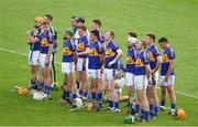27 July 2014; The Tipperary team stand for a minutes silence in memory of Dermot Hogan. GAA Hurling All Ireland Senior Championship Quarter-Final, Tipperary v Dublin. Semple Stadium, Thurles, Co. Tipperary. Picture credit: Ray McManus