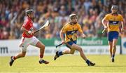 30 July 2014; Tony Kelly, Clare, in action against Cillian Burke, Cork. Bord Gais Energy Munster GAA Hurling Under 21 Championship Final, Cork v Clare. Cusack Park, Ennis, Co. Clare. Picture credit: Stephen McCarthy / SPORTSFILE