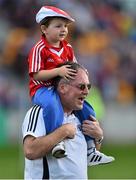 26 July 2014; Leo Jones with Owen Cuthbert, son of Cork manager Brian, after the match. GAA Football All Ireland Senior Championship, Round 4A, Cork v Sligo. O'Connor Park, Tullamore, Co. Offaly. Picture credit: Ramsey Cardy / SPORTSFILE