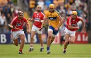 30 July 2014; Peter Duggan, Clare, in action against Michael Collins, right, and Rickard Cahalane, left, Cork. Bord Gais Energy Munster GAA Hurling Under 21 Championship Final, Cork v Clare. Cusack Park, Ennis, Co. Clare. Picture credit: Stephen McCarthy / SPORTSFILE