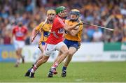 30 July 2014; Alan Cadogan, Cork, in action against Seadna Morey, Clare. Bord Gais Energy Munster GAA Hurling Under 21 Championship Final, Cork v Clare. Cusack Park, Ennis, Co. Clare. Picture credit: Stephen McCarthy / SPORTSFILE