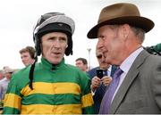 31 July 2014; Jockey Tony McCoy speaking with racing manager to JP McManus Frank Berry after he rode Thomas Edison to win the Guinness Galway Hurdle Handicap. Galway Racing Festival, Ballybrit, Co. Galway. Picture credit: Barry Cregg / SPORTSFILE