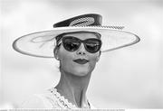 31 July 2014; (Editors please note; This black & white image has been created from an original colour file) Marie Cullimane, from Tourloughmore, Co. Galway, enjoying a day at the races. Galway Racing Festival, Ballybrit, Co. Galway. Picture credit: Barry Cregg / SPORTSFILE