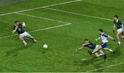 2 August 2014; Chris McGuinness, Monaghan, shoots past David Hyland, and goalkeeper Mark Donnellan, Kildare, to score his side's second goal of the game during the first half of extra time. GAA Football All-Ireland Senior Championship, Round 4B, Kildare v Monaghan, Croke Park, Dublin. Picture credit: Barry Cregg / SPORTSFILE