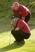 14 September 2006; Trevor Woods, Banbridge Golf Club, and his caddie Kieran Magennis line up what proved to be the winning putt on the 19th during the  Bulmers Junior Cup Final. Bulmers Cups and Shields Finals 2006, Enniscrone Golf Club, Enniscrone, Sligo. Picture credit: Ray McManus / SPORTSFILE