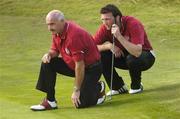 14 September 2006; Ross McCandless, Banbridge Golf Club, right, and his caddie Declan Barry, line up a putt on the 16th during the Bulmers Junior Cup Final. Bulmers Cups and Shields Finals 2006, Enniscrone Golf Club, Enniscrone, Sligo. Picture credit: Ray McManus / SPORTSFILE