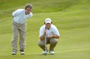 14 September 2006; Ronan Burke, Castle Golf Club, and his caddie Gerry Moran line up a putt on the 6th green during the Bulmers Junior Cup Final. Bulmers Cups and Shields Finals 2006, Enniscrone Golf Club, Enniscrone, Sligo. Picture credit: Ray McManus / SPORTSFILE