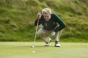 16 September 2006; Michael Sinclair, Knock G.C., lines up a putt on the seventh hole during the Bulmers Senior Cup Final. Bulmers Cups and Shields Finals 2006, Enniscrone Golf Club, Enniscrone, Sligo. Picture credit: Ray McManus / SPORTSFILE