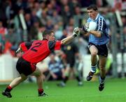 29 August 1999; Alan Brogan of Dublin in action against John Clarke of Down during the All-Ireland Minor Football Semi-Final match between Dublin and Down at Croke Park in Dublin. Photo by Damien Eagers/Sportsfile
