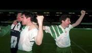 17 November 1993; Republic of Ireland players, from left, John Aldridge, Alan McLoughlin and Denis Irwin celebrate their qualification for the 1994 FIFA World Cup following the FIFA World Cup Qualifying Group 3 match between Northern Ireland and Republic of Ireland at Windsor Park in Belfast. Photo by David Maher/Sportsfile