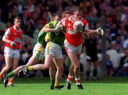 29 August 1999; Andrew McCann of Armagh in action against Donal Curtis of Meath during the Bank of Ireland All-Ireland Senior Football Championship Semi-Final match between Meath and Armagh at Croke Park in Dublin. Photo by Brendan Moran/Sportsfile