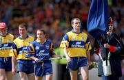 15 August 1999; Clare captain Anthony Daly leads his team during the pre-match parade ahead of the Guinness All-Ireland Senior Hurling Championship Semi-Final match between Kilkenny and Clare at Croke Park in Dublin. Photo by Ray McManus/Sportsfile