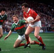 17 September 1989; Barry Coffey of Cork in action against Michael Collins of Mayo during the All-Ireland Senior Football Championship Final between Cork and Mayo at Croke Park in Dublin. Photo by Ray McManus/Sportsfile