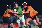 5 June 1999; Brian O'Driscoll of Ireland in action against Lincoln Job, left, and Scott Fava of New South Wales Country during the Ireland Rugby tour to Australia match between New South Wales Country XV and Ireland at the Woy Woy Oval in New South Wales, Australia. Photo by Matt Browne/Sportsfile