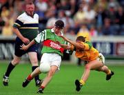4 September 1999; Christina Heffernan of Mayo in action against Ann Marie Dennehy of Meath during the All-Ireland Senior Ladies Football Championship Semi-Final between Mayo and Meath at Parnell Park in Dublin. Photo by Ray Lohan/Sportsfile