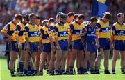 15 August 1999; Clare players stand for a minutes silence, to mark the one year anniversary of the Omagh bombing, prior to the Guinness All-Ireland Senior Hurling Championship Semi-Final match between Kilkenny and Clare at Croke Park in Dublin. Photo by Ray McManus/Sportsfile