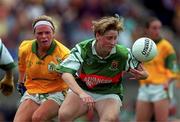 4 September 1999; Cora Staunton of Mayo in action against Deborah Mangan of Meath during the All-Ireland Senior Ladies Football Championship Semi-Final between Mayo and Meath at Parnell Park in Dublin. Photo by Ray Lohan/Sportsfile