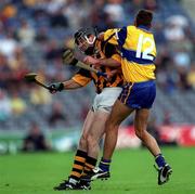15 August 1999; DJ Carey of Kilkenny in action against PJ O'Connell of Clare during the Guinness All-Ireland Senior Hurling Championship Semi-Final match between Kilkenny and Clare at Croke Park in Dublin. Photo by Ray McManus/Sportsfile