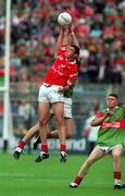 22 August 1999; Damien Delaney of Cork in action against Gavin Duffy of Mayo during the All-Ireland Minor Football Championship Semi-Final match between Cork and Mayo at Croke Park in Dublin. Photo by Matt Browne/Sportsfile