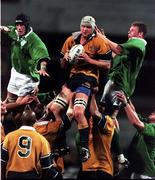 19 June 1999; David Giffin of Australia takes the ball in a lineout ahead of Ireland's Paddy Johns, left, and Malcolm O'Kelly, right,  during the Ireland Rugby tour to Australia Second Test match between Australia and Ireland at the Subiaco Oval in Perth, Australia. Photo by Matt Browne/Sportsfile