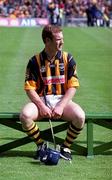 15 August 1999; Kilkenny captain Denis Byrne awaits his team-mates for their team photograph prior to the Guinness All-Ireland Senior Hurling Championship Semi-Final match between Kilkenny and Clare at Croke Park in Dublin. Photo by Brendan Moran/Sportsfile