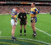 14 September 1997; Referee Dickie Murphy, centre, conducts the coin toss with Tipperary captain Conor Gleeson, left and Clare captain Anthony Daly prior to the Guinness All-Ireland Senior Hurling Championship Final between Clare and Tipperary at Croke Park in Dublin. Photo by Ray McManus/Sportsfile