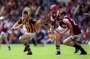 15 August 1999; Gordon Byrne of Kilkenny, in action against Damien McLoughlin, 21, and Conor Dervan of Galway during the All-Ireland Minor Hurling Championship Semi-Final match between Galway and Kilkenny at Croke Park in Dublin. Photo by Brendan Moran/Sportsfile