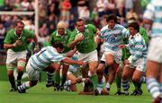 28 August 1999; Conor O'Shea of Ireland is tackled by Roberto Grau, 1, of Argentina during the Rugby World Cup Warm-up match between Ireland and Argentina at Lansdowne Road in Dublin. Photo by David Maher/Sportsfile