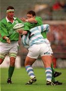 28 August 1999; Tom Tierney with the support of his Ireland team-mate Dion O'Cuinneagain is tackled by Roberto Grau of Argentina during the Rugby World Cup Warm-up match between Ireland and Argentina at Lansdowne Road in Dublin. Photo by David Maher/Sportsfile