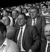 3 September 1989; Former Republic of Ireland manager Jack Charlton, accompanied by Maurice Setters and Joe Delaney, watch on during the All-Ireland Senior Hurling Championship Final between Tipperary and Antrim at Croke Park in Dublin. Photo by Ray McManus/Sportsfile