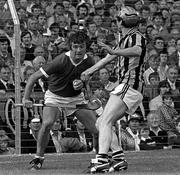 2 September 1983; Jimmy Barry Murphy of Cork in action against John Henderson of Kilkenny during the All-Ireland Senior Hurling Championship Final between Kilkenny and Cork at Croke Park in Dublin. Photo by Ray McManus/Sportsfile