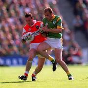 29 August 1999; John Donaldson of Armagh in action against John McDermott of Meath during the Bank of Ireland All-Ireland Senior Football Championship Semi-Final match between Meath and Armagh at Croke Park in Dublin. Photo by Ray McManus/Sportsfile