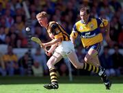 15 August 1999; John Power of Kilkenny in action against Anthony Daly of Clare during the Guinness All-Ireland Senior Hurling Championship Semi-Final match between Kilkenny and Clare at Croke Park in Dublin. Photo by Brendan Moran/Sportsfile