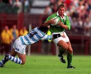 28 August 1999; Justin Bishop of  Ireland is tackled by Diego Albanese of Argentina during the Rugby World Cup Warm-up match between Ireland and Argentina at Lansdowne Road in Dublin. Photo by Brendan Moran/Sportsfile