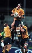 19 June 1999; Matt Cockbain of Australia takes possession in a lineout, assisted by team-mates Don Crowley, left, and David Giffin, right, during the Ireland Rugby tour to Australia Second Test match between Australia and Ireland at the Subiaco Oval in Perth, Australia. Photo by Matt Browne/Sportsfile