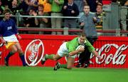 28 August 1999; Ireland's Matt Mostyn scores his first, and his side's second, try during the Rugby World Cup Warm-up match between Ireland and Argentina at Lansdowne Road in Dublin. Photo by David Maher/Sportsfile
