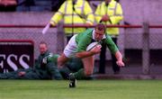 28 August 1999; Matt Mostyn of Ireland goes over for his second try during the Rugby World Cup Warm-up match between Ireland and Argentina at Lansdowne Road in Dublin. Photo by David Maher/Sportsfile