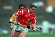 8 August 1999; Michael O'Connell of Cork in action against Johnny Pilkington of Offaly during the Guinness All-Ireland Senior Hurling Championship Semi-Final match between Cork and Offaly at Croke Park in Dublin. Photo by Ray McManus/Sportsfile
