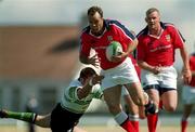 14 August 1999; Mike Mullins of Munster is tackled by John Casserly of Connacht during the Guinness Interprovincial Championship match between Connacht and Munster at The Sportsground in Galway. Photo by Aoife Rice/Sportsfile