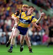 15 August 1999; Niall Gilligan of Clare in action against Canice Brennan of Kilkenny during the Guinness All-Ireland Senior Hurling Championship Semi-Final match between Kilkenny and Clare at Croke Park in Dublin. Photo by Brendan Moran/Sportsfile