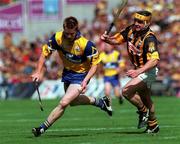 15 August 1999; Niall Gilligan of Clare in action against Canice Brennan of Kilkenny during the Guinness All-Ireland Senior Hurling Championship Semi-Final match between Kilkenny and Clare at Croke Park in Dublin. Photo by Damien Eagers/Sportsfile