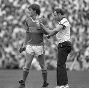 12 July 1987; Nicky English of Tipperary, left, and team masseuse Willie Bennett during the Munster Senior Hurling Championship Final between Tipperary and Cork at Semple Stadium in Thurles, Tipperary. Photo by Ray McManus/Sportsfile