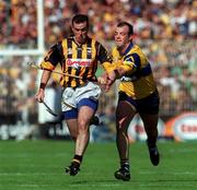 15 August 1999; Brian McEvoy of Kilkenny in action against Ollie Baker of Clare during the Guinness All-Ireland Senior Hurling Championship Semi-Final match between Kilkenny and Clare at Croke Park in Dublin. Photo by Damien Eagers/Sportsfile