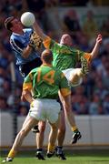 1 August 1999; Paddy Christie of Dublin in action against Meath's Ollie Murphy, with the support of his team-mate Graham Geraghty, during the Bank of Ireland Leinster Senior Football Championship Final between Meath and Dublin at Croke Park in Dublin. Photo by Ray McManus/Sportsfile