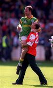 29 August 1999; Meath's Paddy Reynolds is lifted by team-mate Jody Devine in celebration following the Bank of Ireland All-Ireland Senior Football Championship Semi-Final match between Meath and Armagh at Croke Park in Dublin. Photo by Ray McManus/Sportsfile