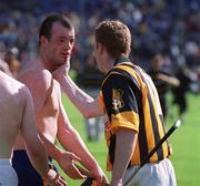 15 August 1999; Kilkenny's Peter Barry commiserates with Clare's Ollie Baker following the Guinness All-Ireland Senior Hurling Championship Semi-Final match between Kilkenny and Clare at Croke Park in Dublin. Photo by Aoife Rice/Sportsfile