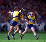 15 August 1999; Peter Barry of Kilkenny in action against Alan Markham of Clare during the Guinness All-Ireland Senior Hurling Championship Semi-Final match between Kilkenny and Clare at Croke Park in Dublin. Photo by Brendan Moran/Sportsfile